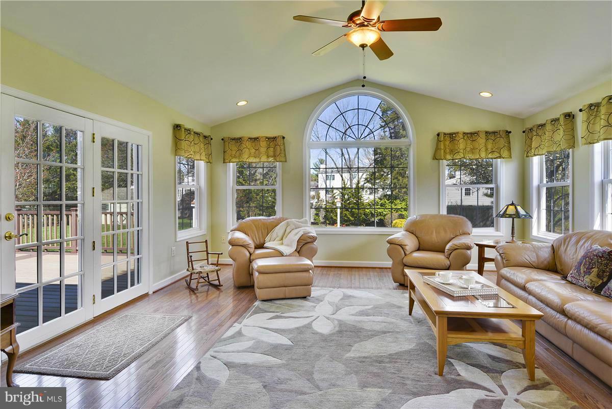 19107 Munger Farm Road Poolesville, MD 20837 - Photo 3 of 30 a living room with furniture and a large window