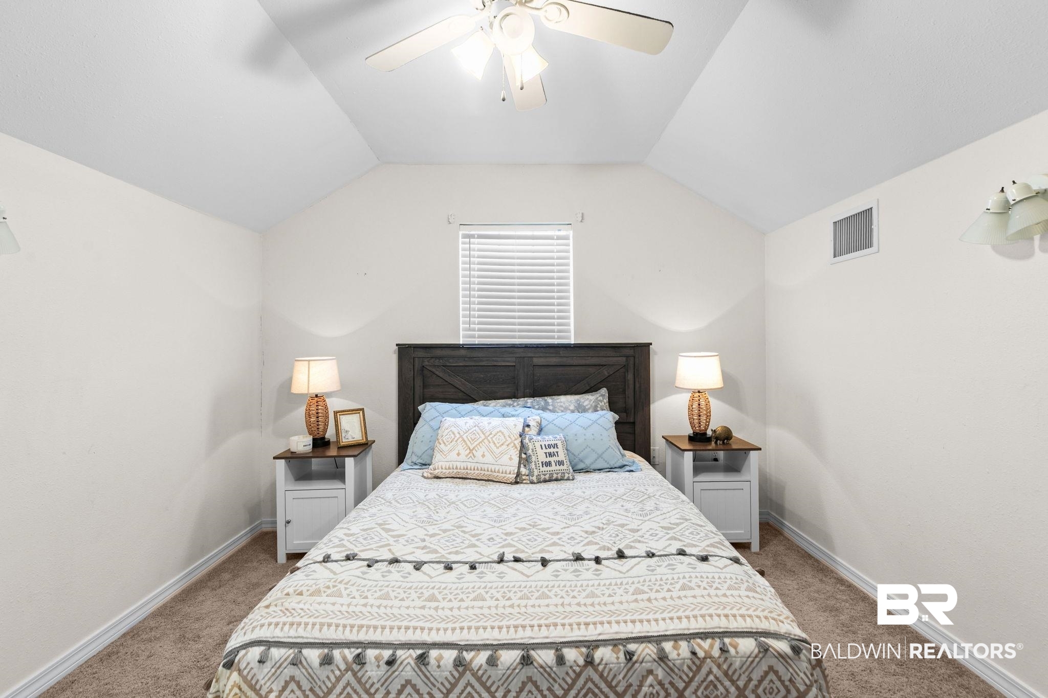 3842 Experiment Farm Road Monroeville, AL 36460 - Photo 51 of 59 Bedroom featuring vaulted ceiling, a ceiling fan, and light colored carpet