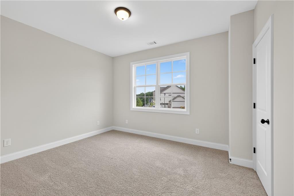 3787 Cheyenne Lane Jefferson, GA 30549 - Photo 32 of 82 a view of an empty room with a window