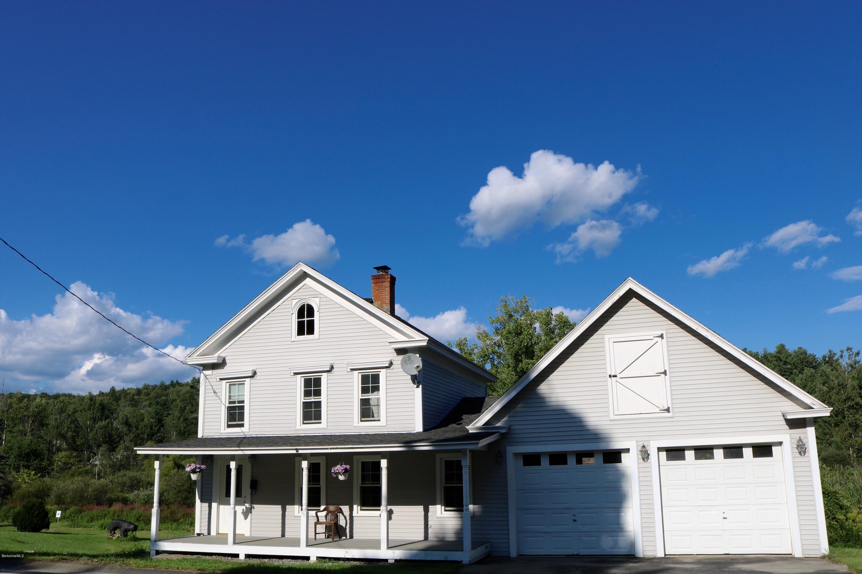 87 South Main Road Otis, MA 01253 - Photo 3 of 35 a view of house with a yard and balcony