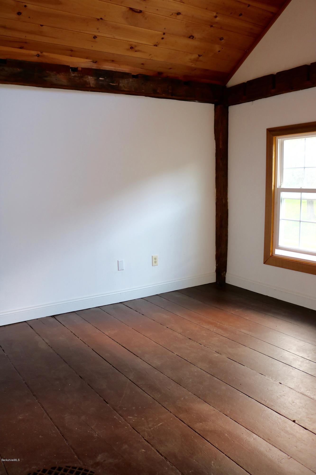 87 South Main Road Otis, MA 01253 - Photo 24 of 35 a view of a room with wooden floor and window