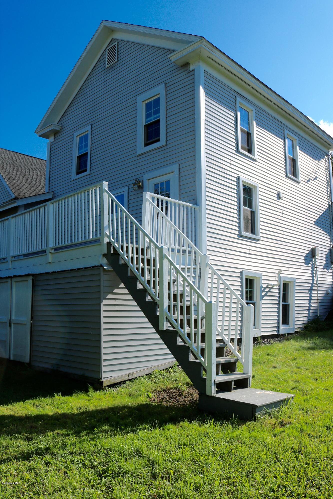 87 South Main Road Otis, MA 01253 - Photo 8 of 35 a view of a house with a yard