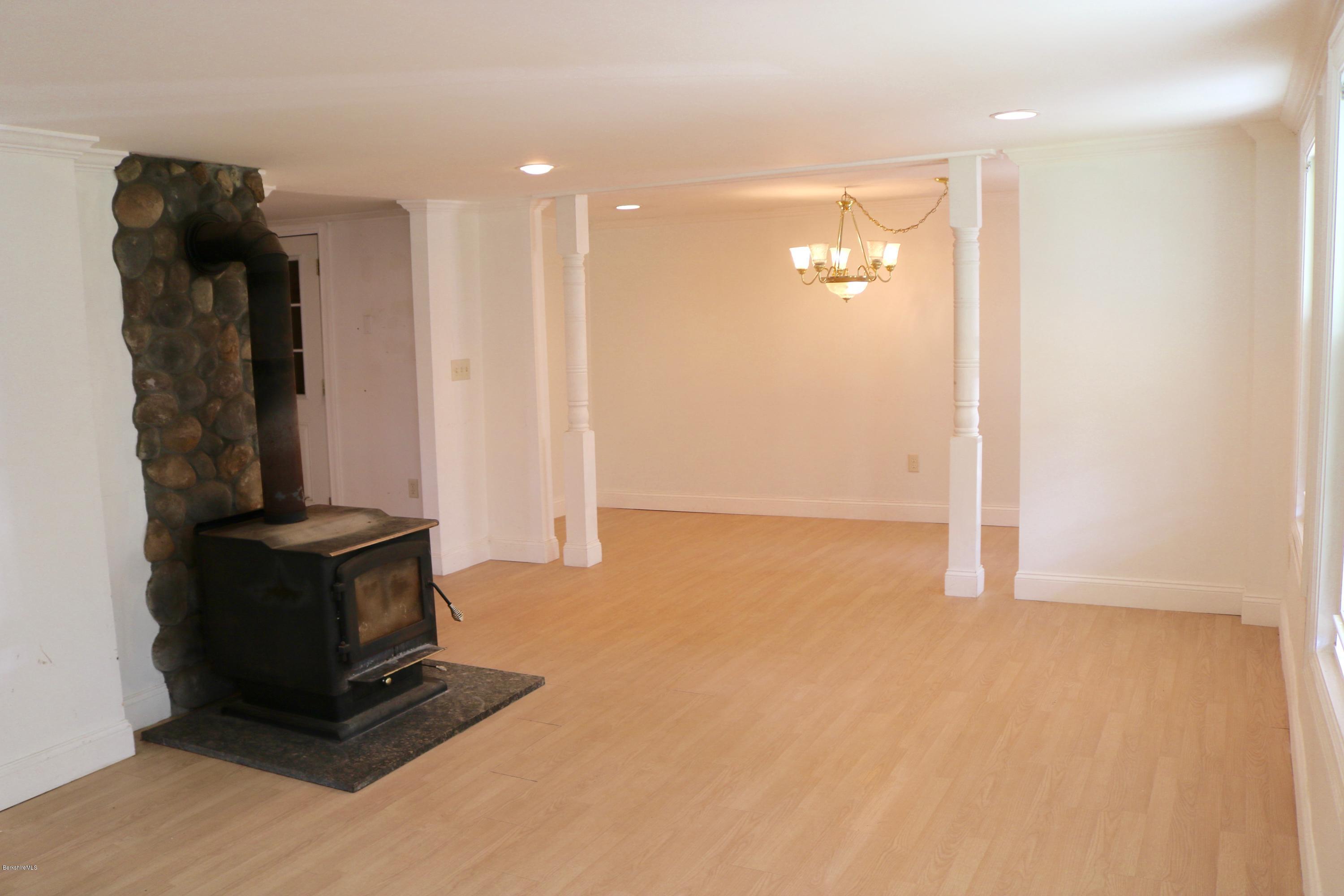 87 South Main Road Otis, MA 01253 - Photo 10 of 35 a view of an empty room with cabinet and a mirror