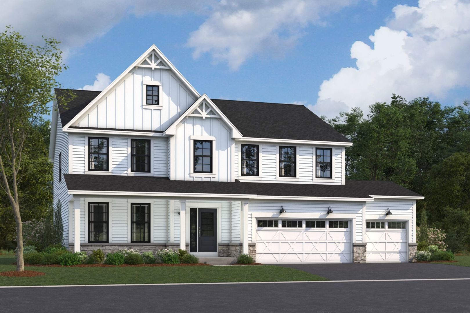 a view of a white house with a yard and potted plants