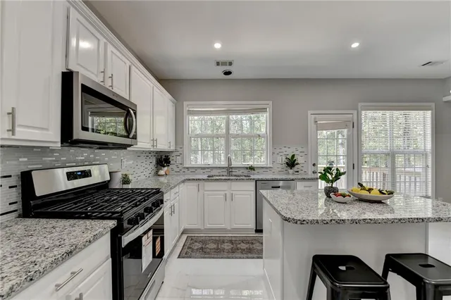 $585,000 | 623 Friars Head Court Northeast, Suwanee, GA 30024