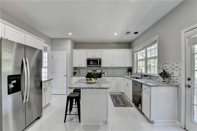 $585,000 | 623 Friars Head Court Northeast, Suwanee, GA 30024