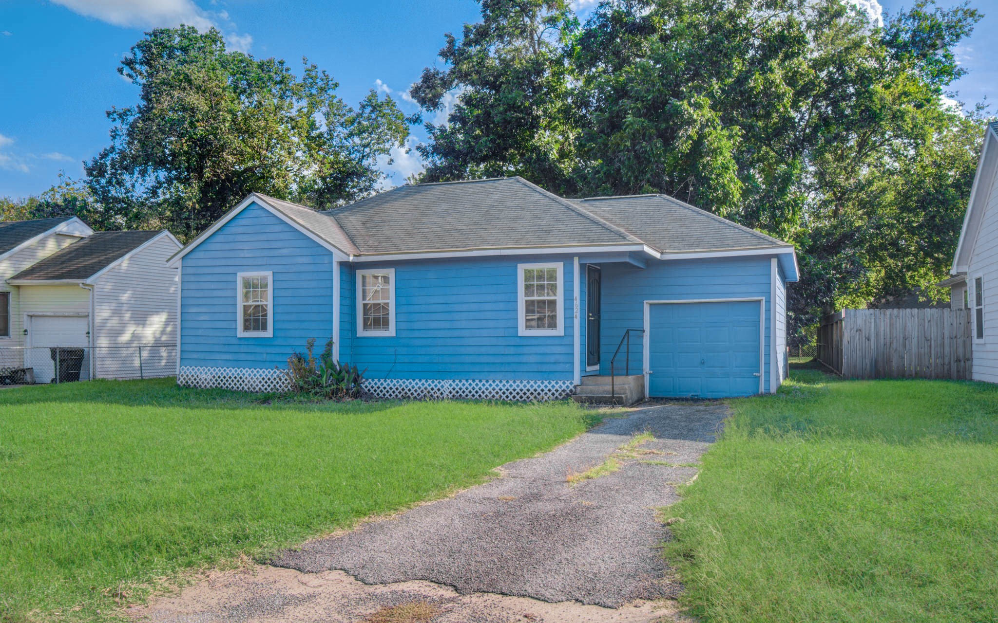 4624 Kingsbury Street Houston, TX 77021 - Photo 3 of 31 a front view of a house with a garden and yard