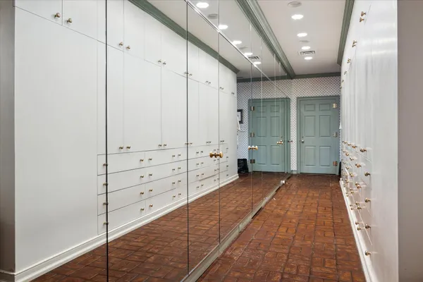 a view of a hallway with closet