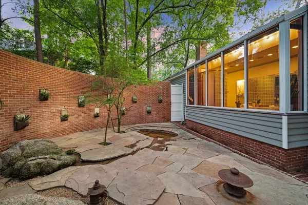 a backyard of a house with seating space