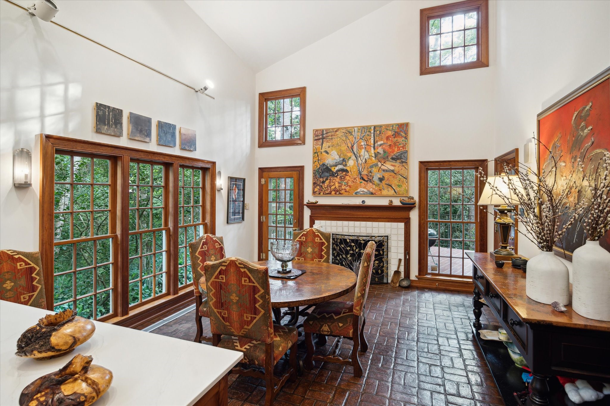 3971 Inverness Drive Houston, TX 77019 - Photo 31 of 50 a living room with furniture and a floor to ceiling window