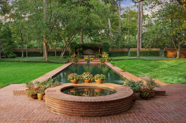 a view of swimming pool with a patio