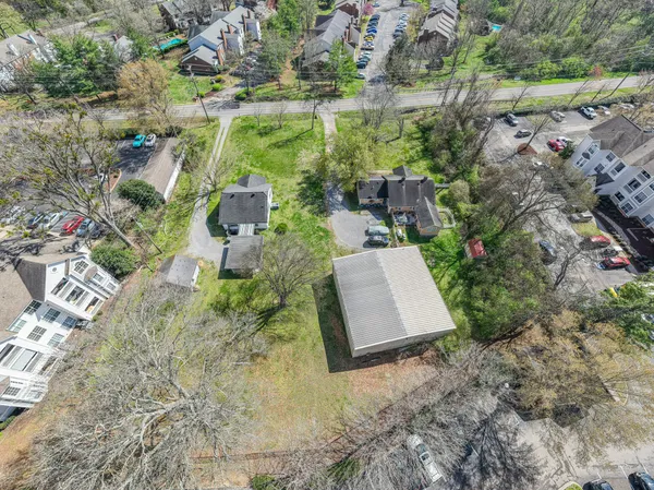 an aerial view of residential house with outdoor space