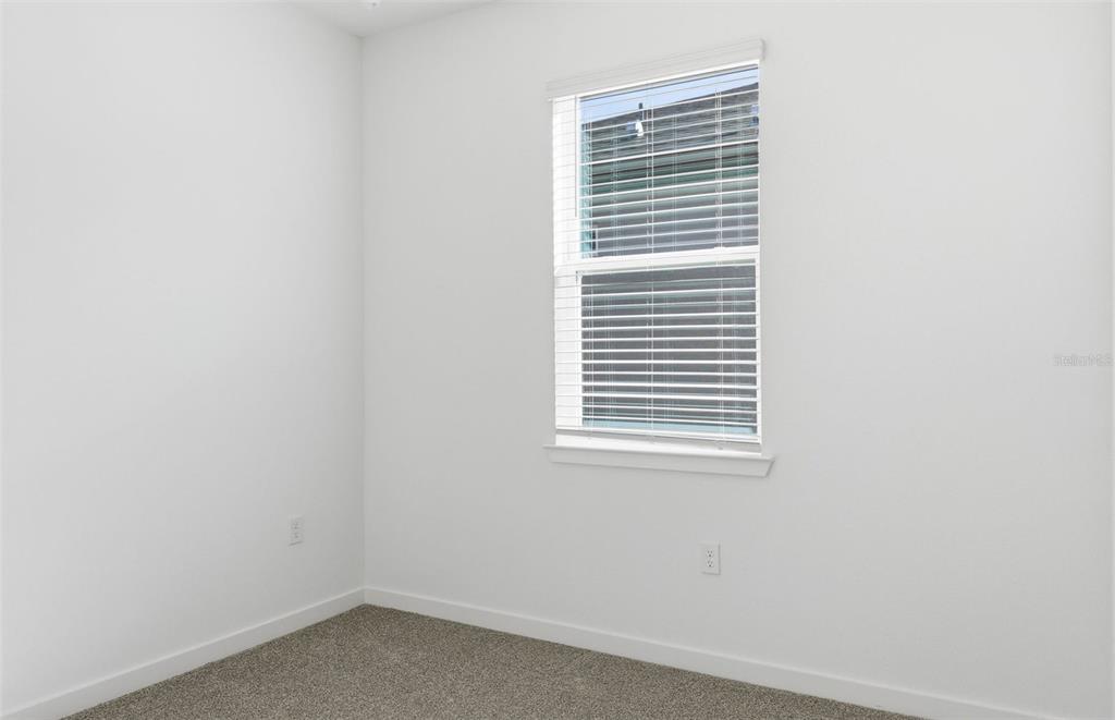 6933 Southwest 90th Place Ocala, FL 34476 - Photo 13 of 17 a small space with a window