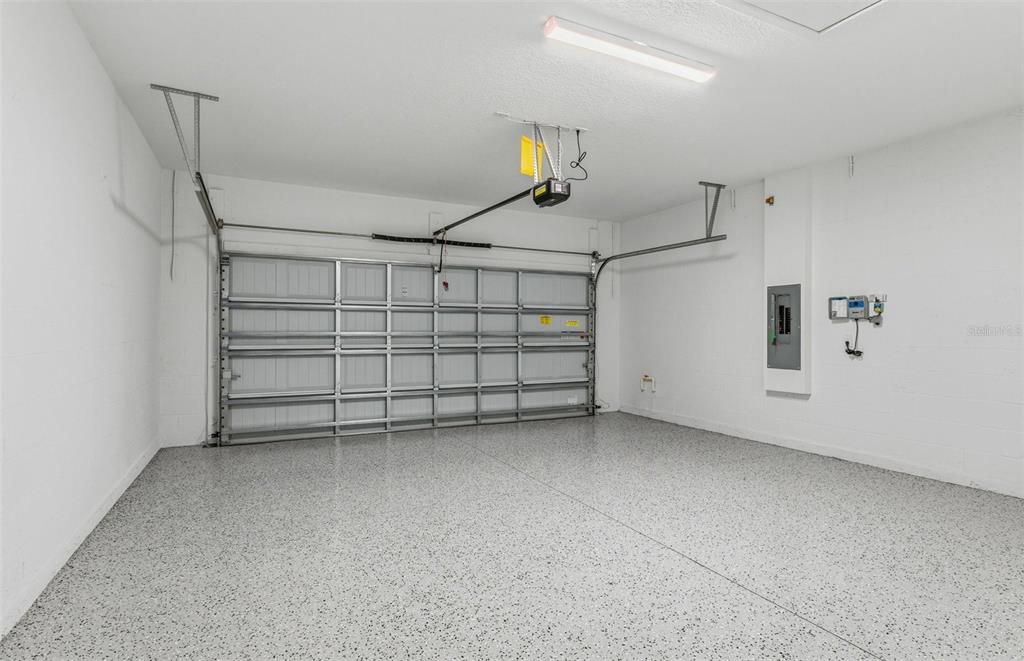 6933 Southwest 90th Place Ocala, FL 34476 - Photo 16 of 17 a view of a garage