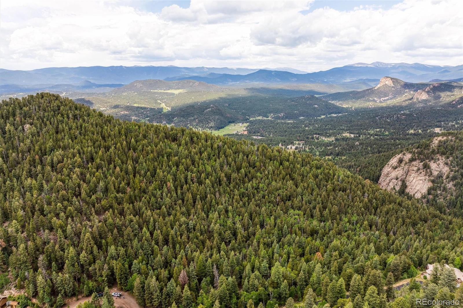 31545 Pike View Drive Conifer, CO 80433 - Photo 2 of 21 a view of mountain view with mountains in the background