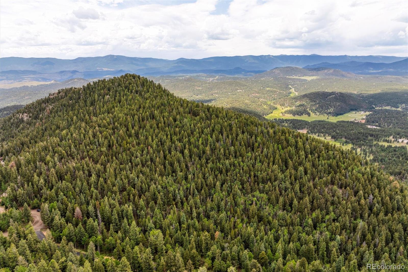 31545 Pike View Drive Conifer, CO 80433 - Photo 4 of 21 a view of mountain with lake