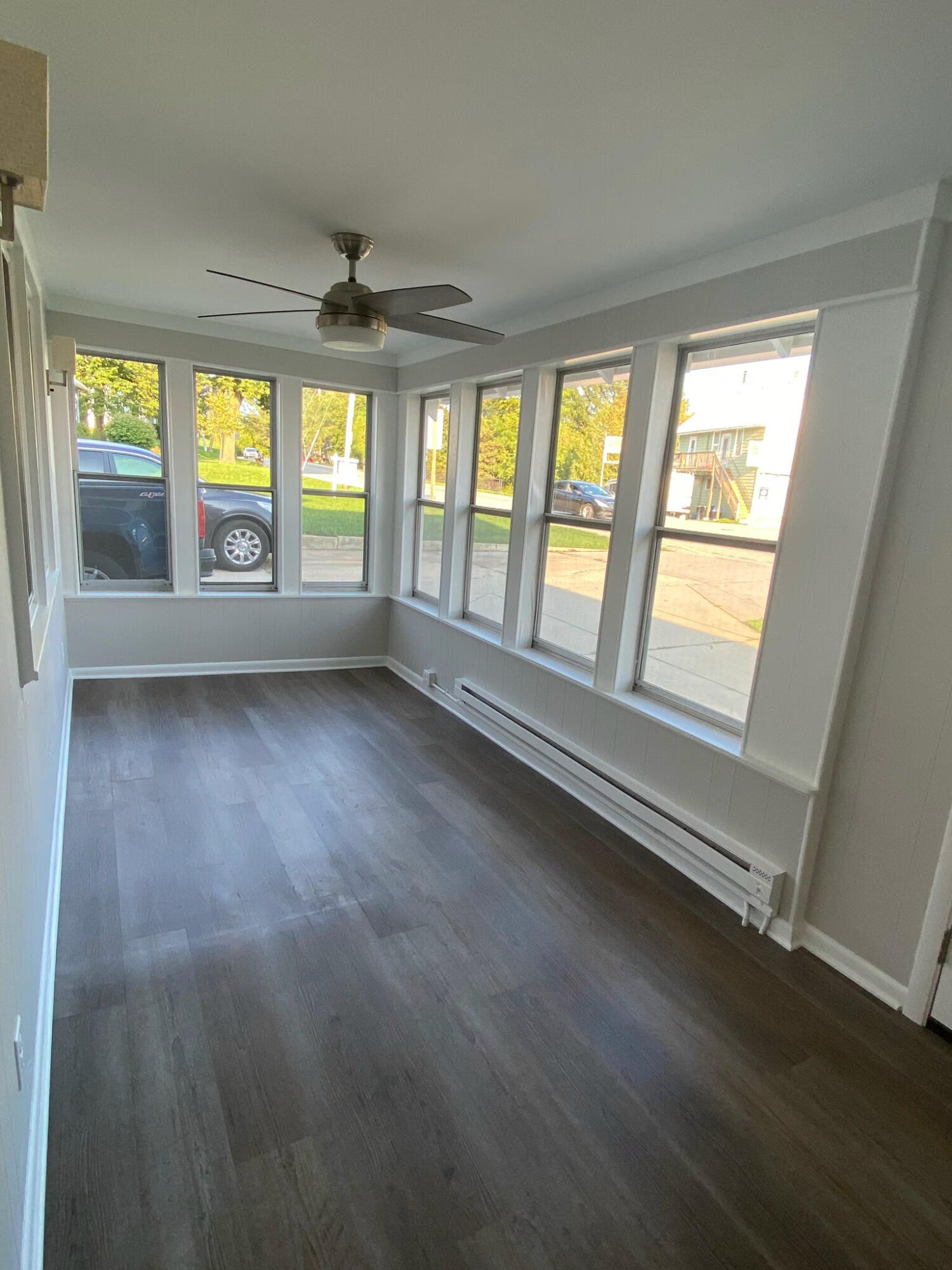 142 Main Street, Unit 144 Sullivan, WI 53178 - Photo 14 of 24 144-main-st-sullivan-wi-sunroom