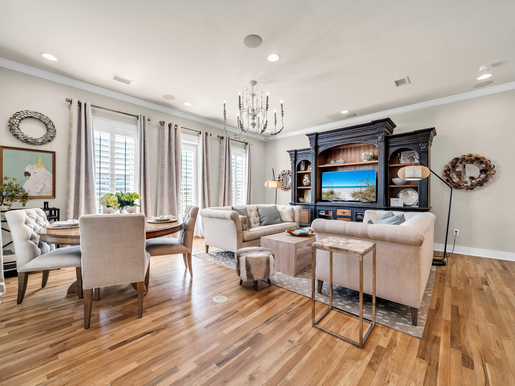 10140 East County Highway 30A, Unit 1 Inlet Beach, FL 32461 - Photo 14 of 54 a living room with furniture a flat screen tv and wooden floor