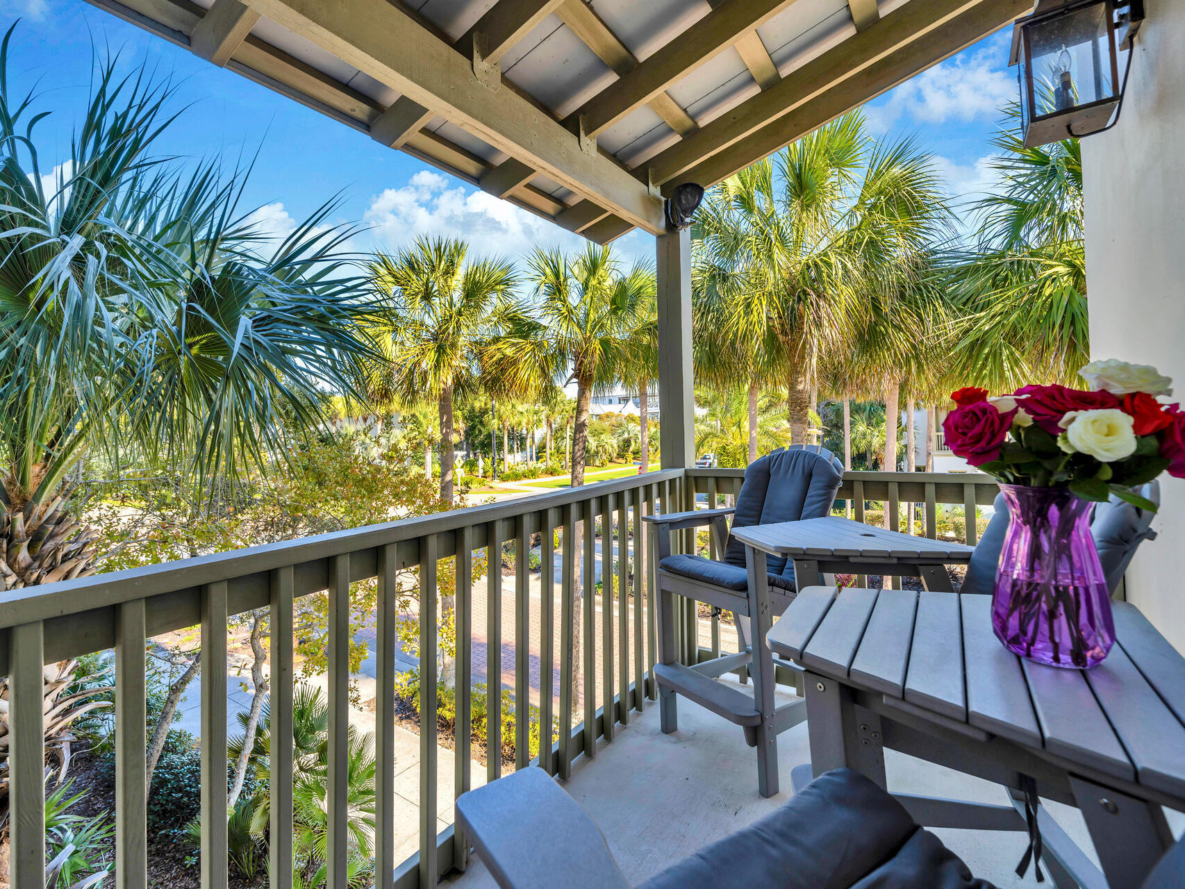 10140 East County Highway 30A, Unit 1 Inlet Beach, FL 32461 - Photo 20 of 54 a view of a chairs and table in the balcony