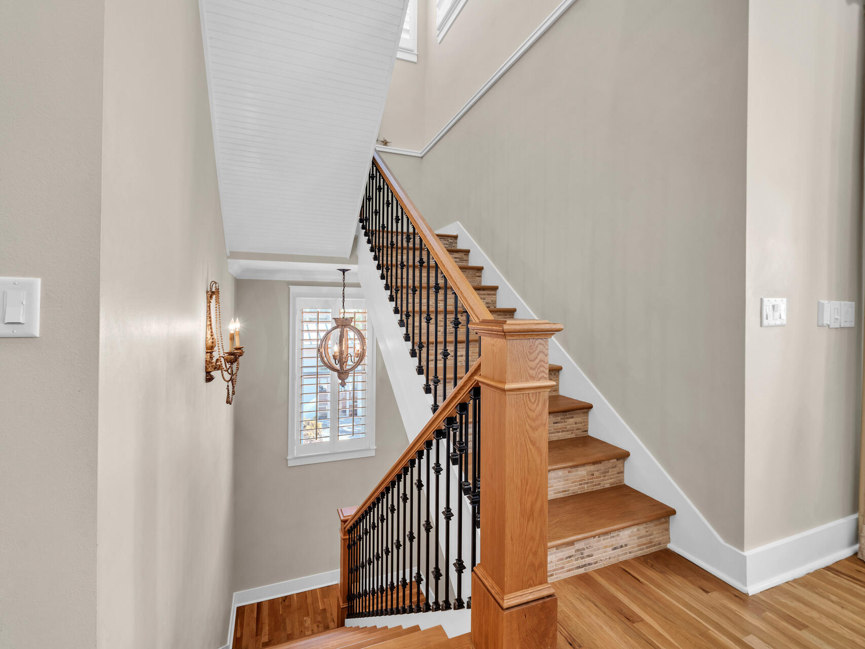10140 East County Highway 30A, Unit 1 Inlet Beach, FL 32461 - Photo 28 of 54 a view of staircase with wooden floor and white walls