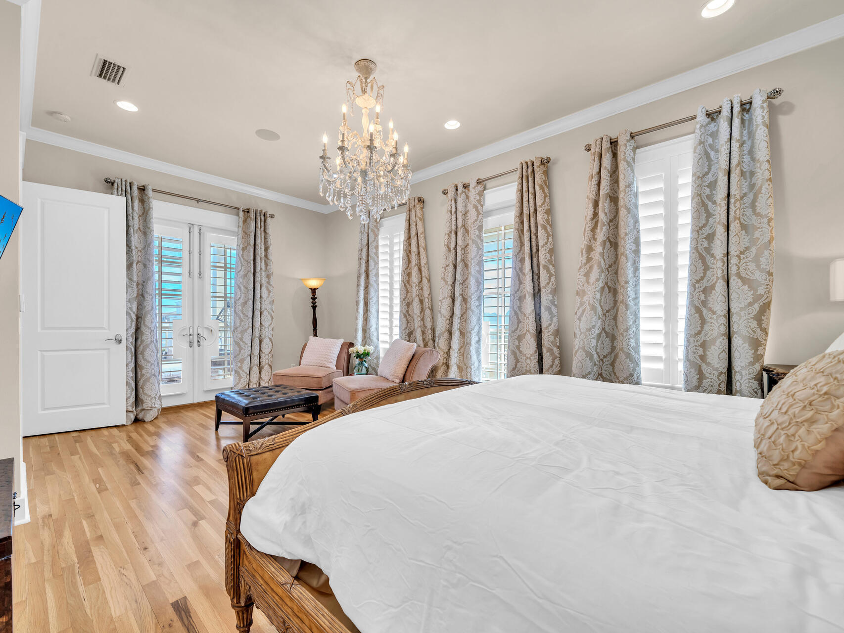 10140 East County Highway 30A, Unit 1 Inlet Beach, FL 32461 - Photo 31 of 54 a bed room with a bed and a chandelier