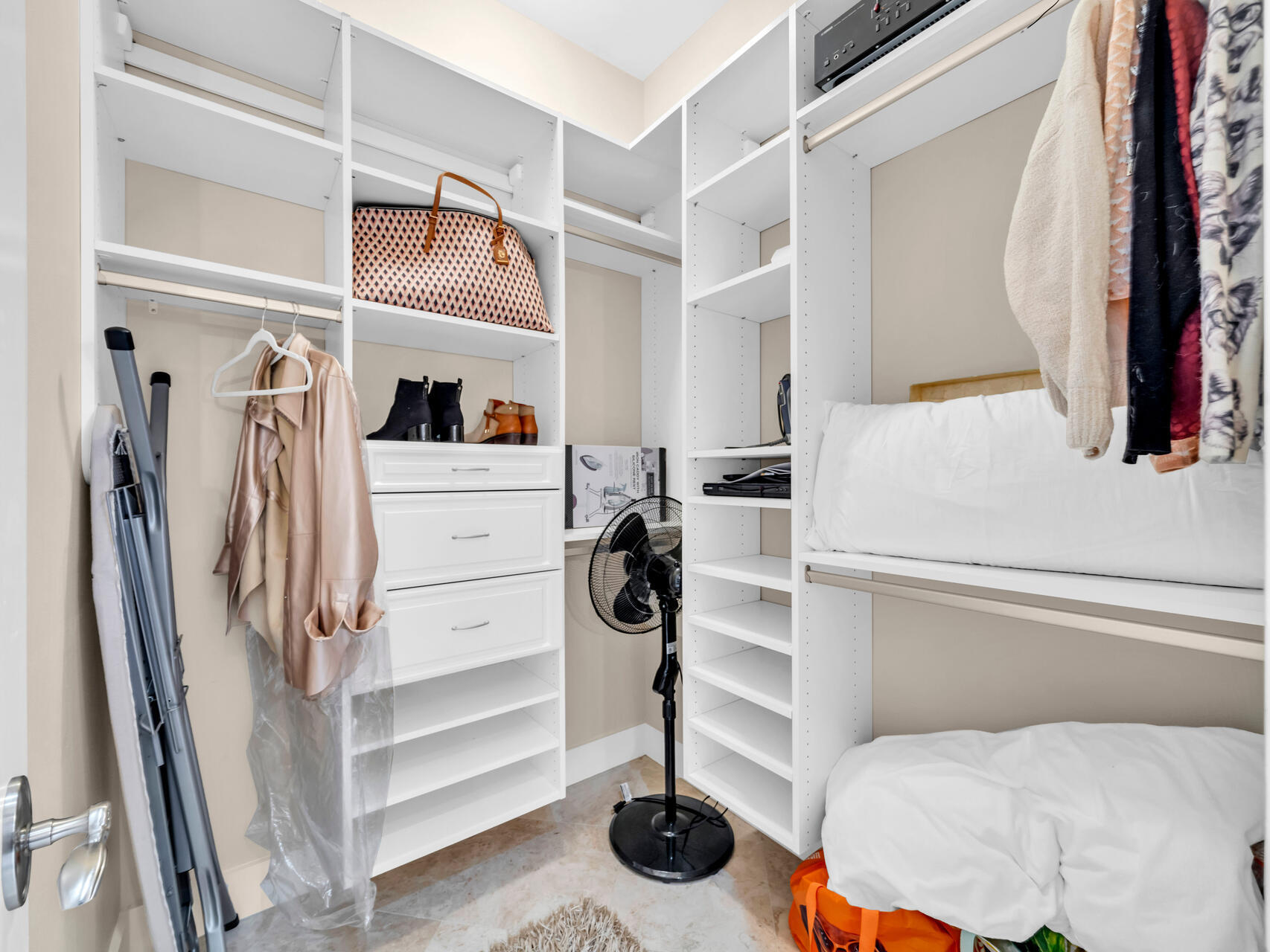 10140 East County Highway 30A, Unit 1 Inlet Beach, FL 32461 - Photo 40 of 54 a view of walk in closet with clothes and shoes