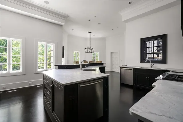 a bathroom with a sink a toilet and a tub