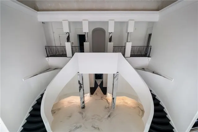 a room with a bed and a window