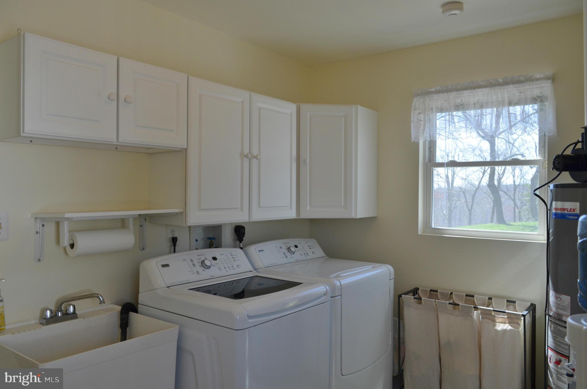 75 Fairhaven Road Tracys Landing, MD 20779 - Photo 14 of 30 a utility room with dryer and washer
