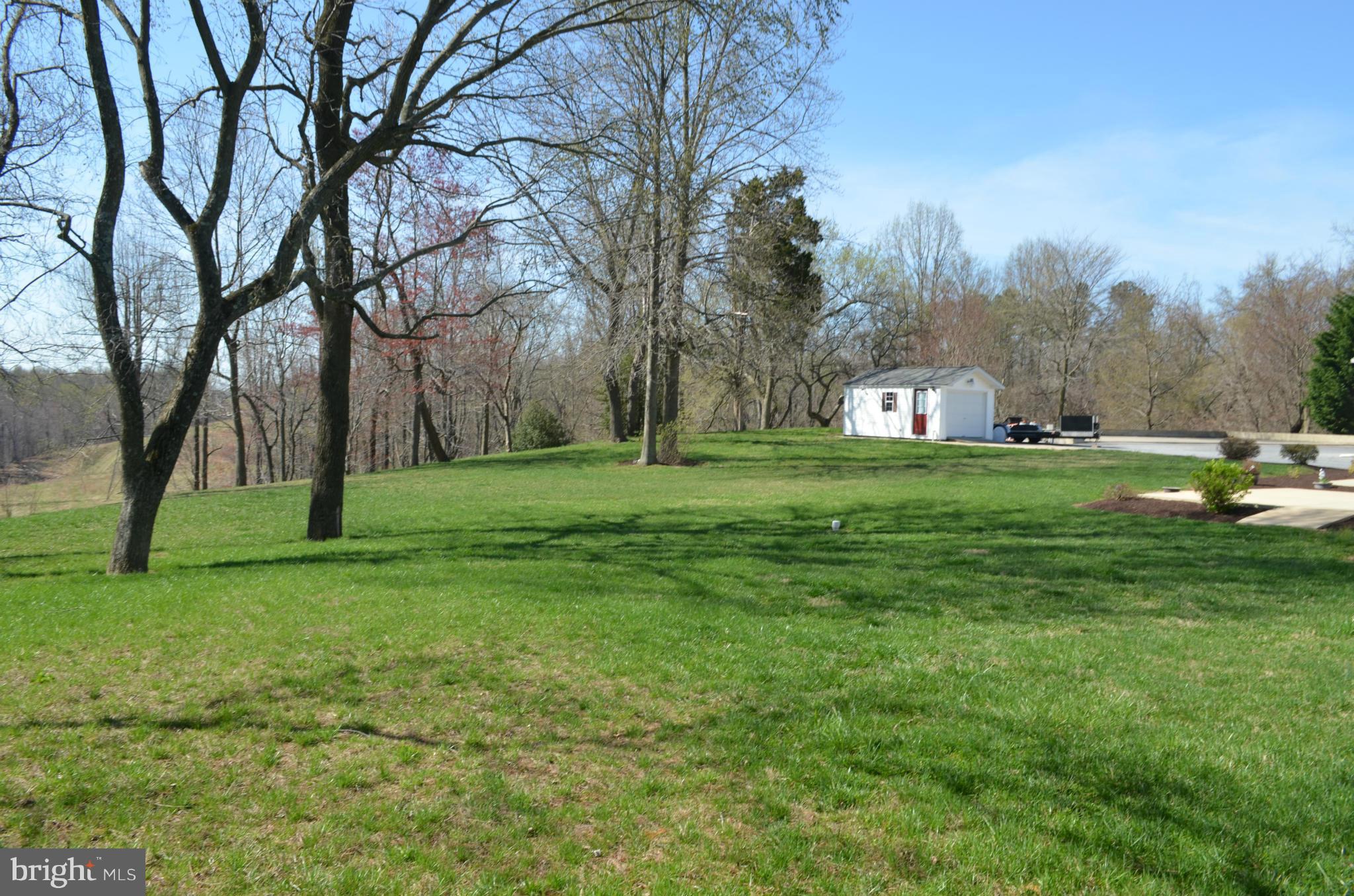 75 Fairhaven Road Tracys Landing, MD 20779 - Photo 29 of 30 a big yard with lots of green space and trees