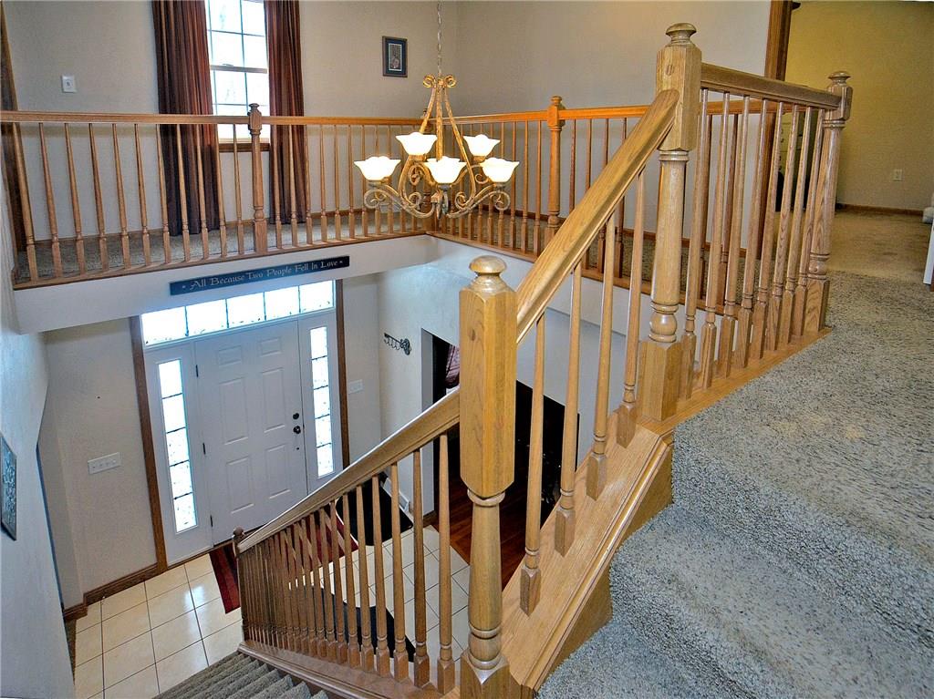 1488 Cavitt Road Monroeville, PA 15146 - Photo 2 of 23 Open two-story ceramic tile foyer with oak staircase