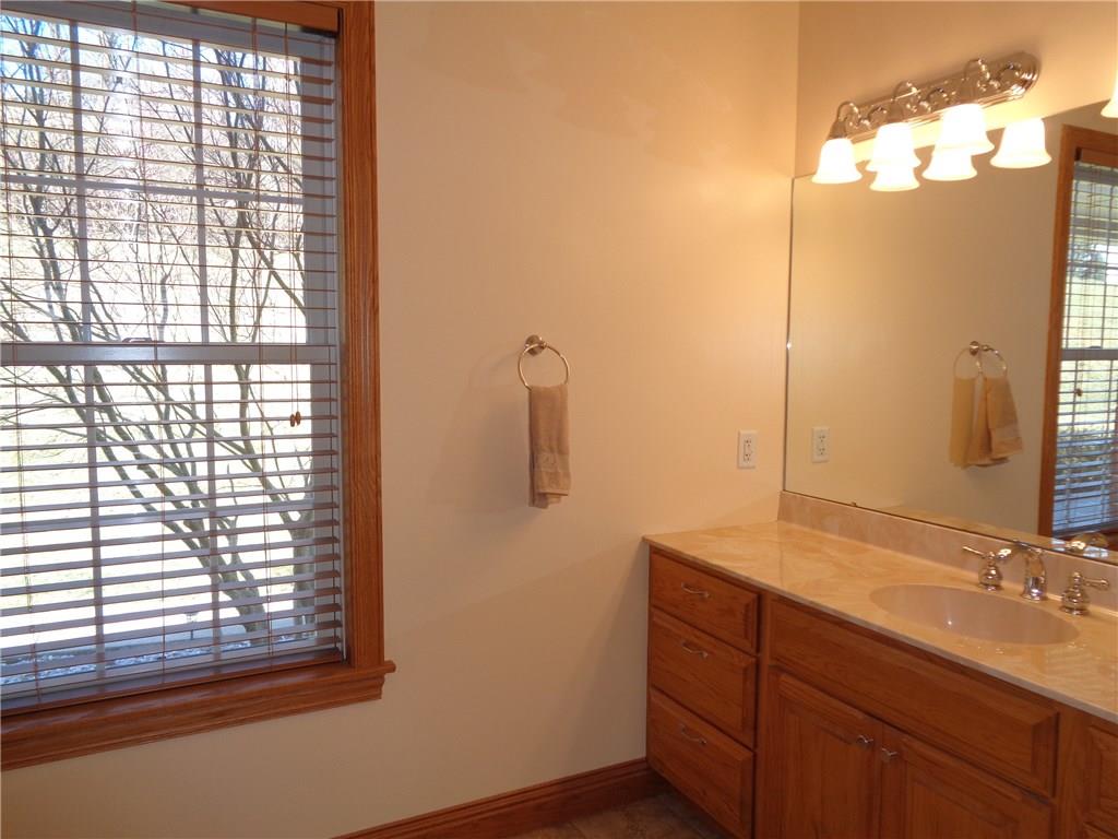1488 Cavitt Road Monroeville, PA 15146 - Photo 12 of 23 En-suite master bath with two seat shower, extra large vanity and plenty of natural light