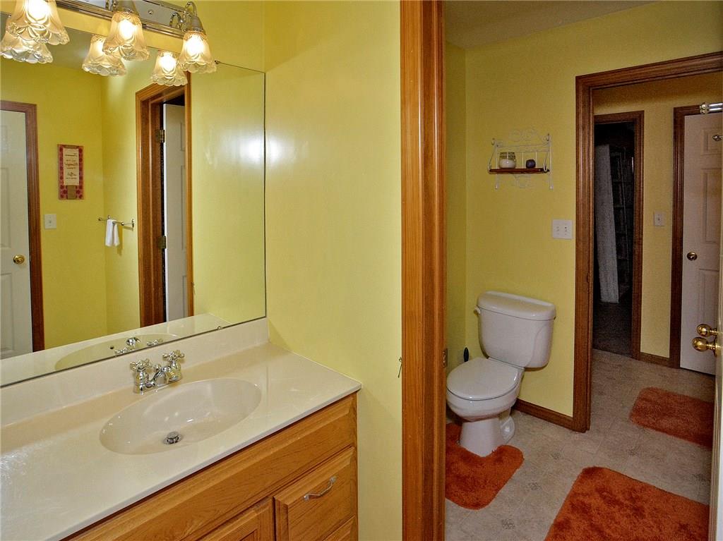 1488 Cavitt Road Monroeville, PA 15146 - Photo 15 of 23 Jack & Jill bath with two vanities separate the second and third bedrooms