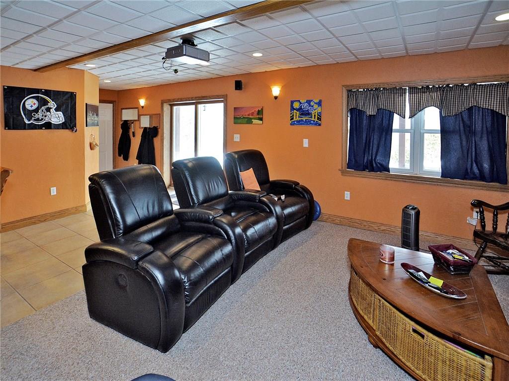 1488 Cavitt Road Monroeville, PA 15146 - Photo 19 of 23 Media room with projector - movie night with the kids