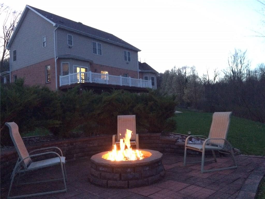 1488 Cavitt Road Monroeville, PA 15146 - Photo 23 of 23 Gather around the gas fire pit on a chilly Spring evening