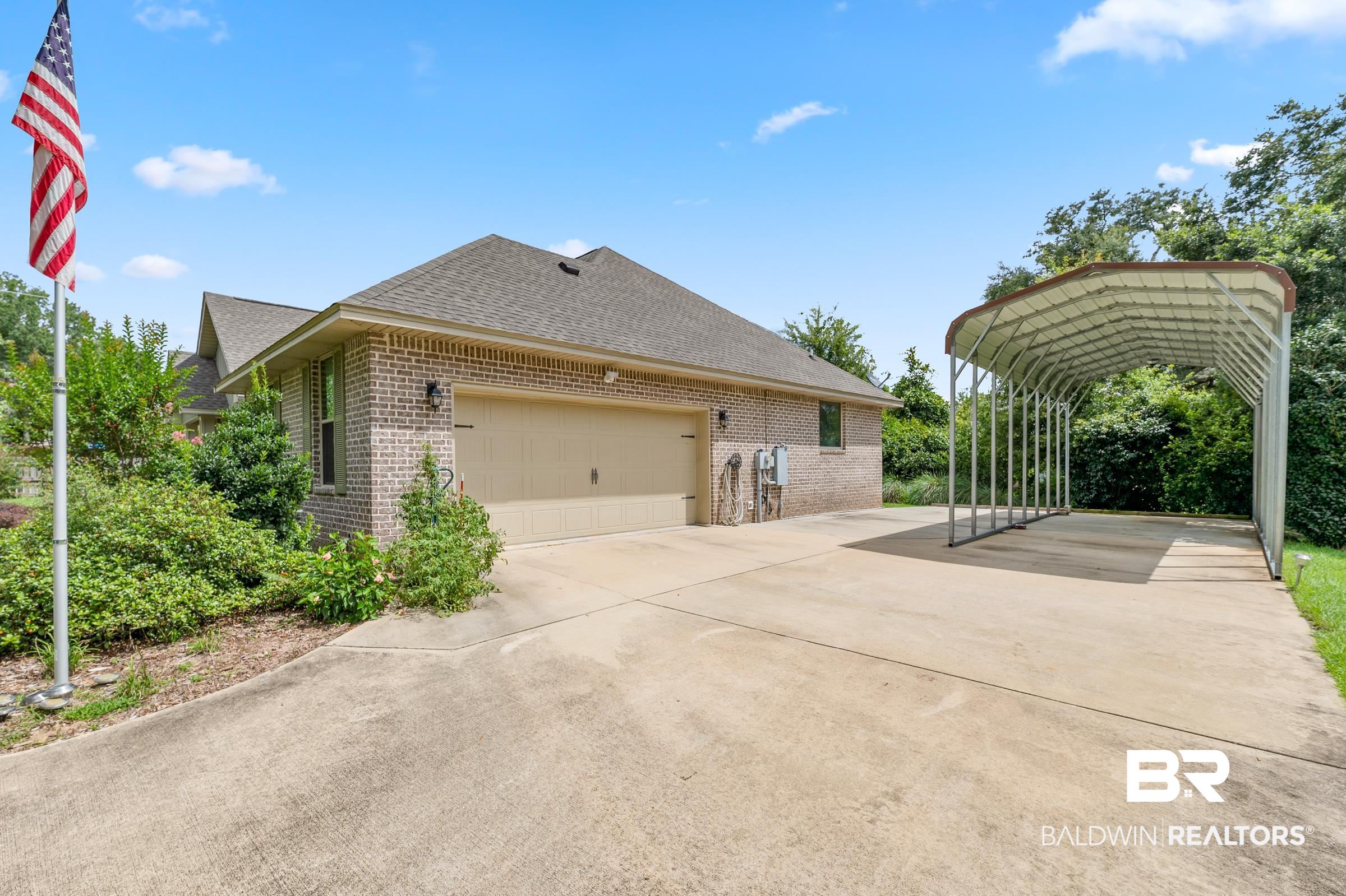12292 Bayside Oaks Street Lillian, AL 36549 - Photo 24 of 30 Side Entry Garage