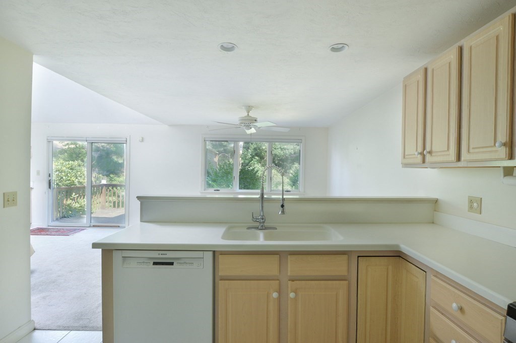 3 Kettle Lane, Unit 3 Mashpee, MA 02649 - Photo 14 of 30 a kitchen with a sink and a window