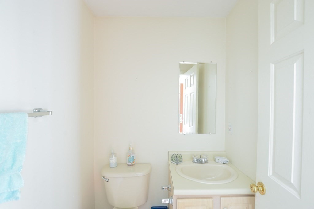 3 Kettle Lane, Unit 3 Mashpee, MA 02649 - Photo 20 of 30 a bathroom with a sink and a mirror