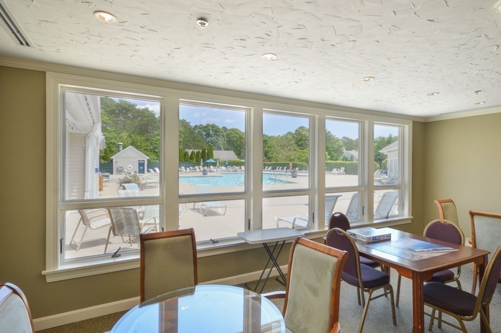 3 Kettle Lane, Unit 3 Mashpee, MA 02649 - Photo 29 of 30 a view of a dining room with furniture window and outside view