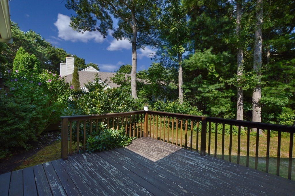3 Kettle Lane, Unit 3 Mashpee, MA 02649 - Photo 8 of 30 a view of a wooden bridge