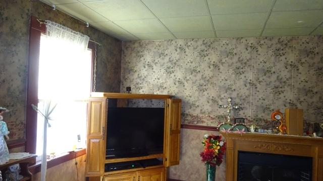19 Everett Road Buzzards Bay, MA 02532 - Photo 12 of 30 a living room with a fireplace