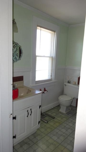 19 Everett Road Buzzards Bay, MA 02532 - Photo 19 of 30 a bathroom with a toilet sink and mirror