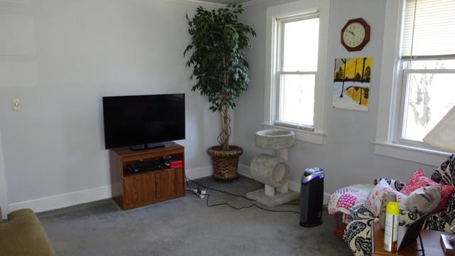 19 Everett Road Buzzards Bay, MA 02532 - Photo 21 of 30 a living room with furniture and a flat screen tv