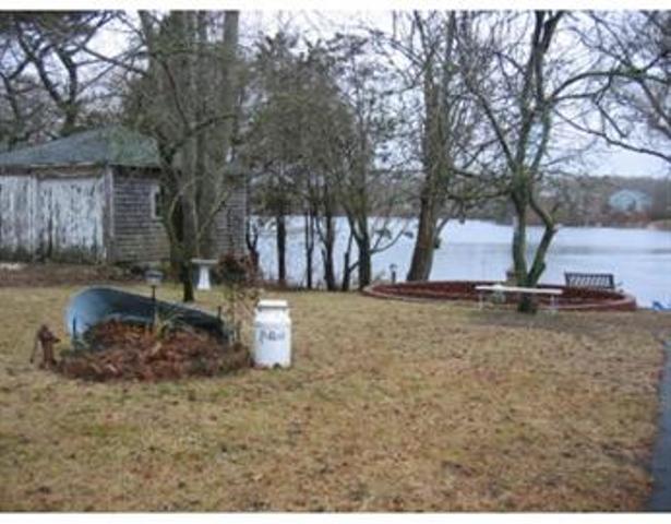 19 Everett Road Buzzards Bay, MA 02532 - Photo 27 of 30 a view of a yard with a tree