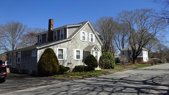 19 Everett Road Buzzards Bay, MA 02532 - Photo 3 of 30 a front view of a house with a yard