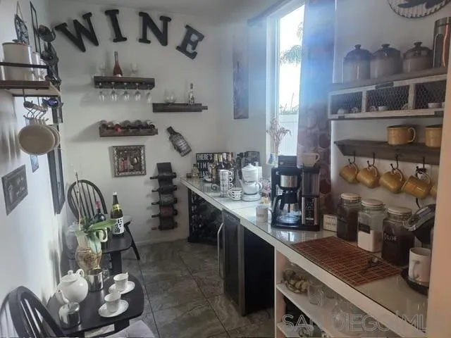a kitchen with a stove and cabinets