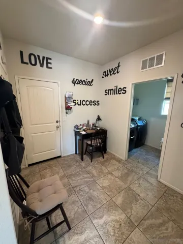 a bathroom with a sink double vanity and a mirror