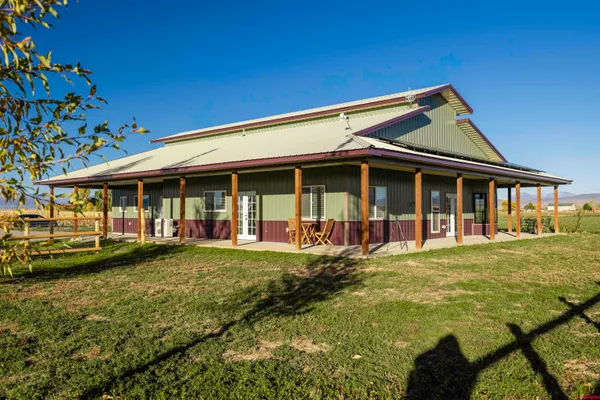front view of a house with a swimming pool