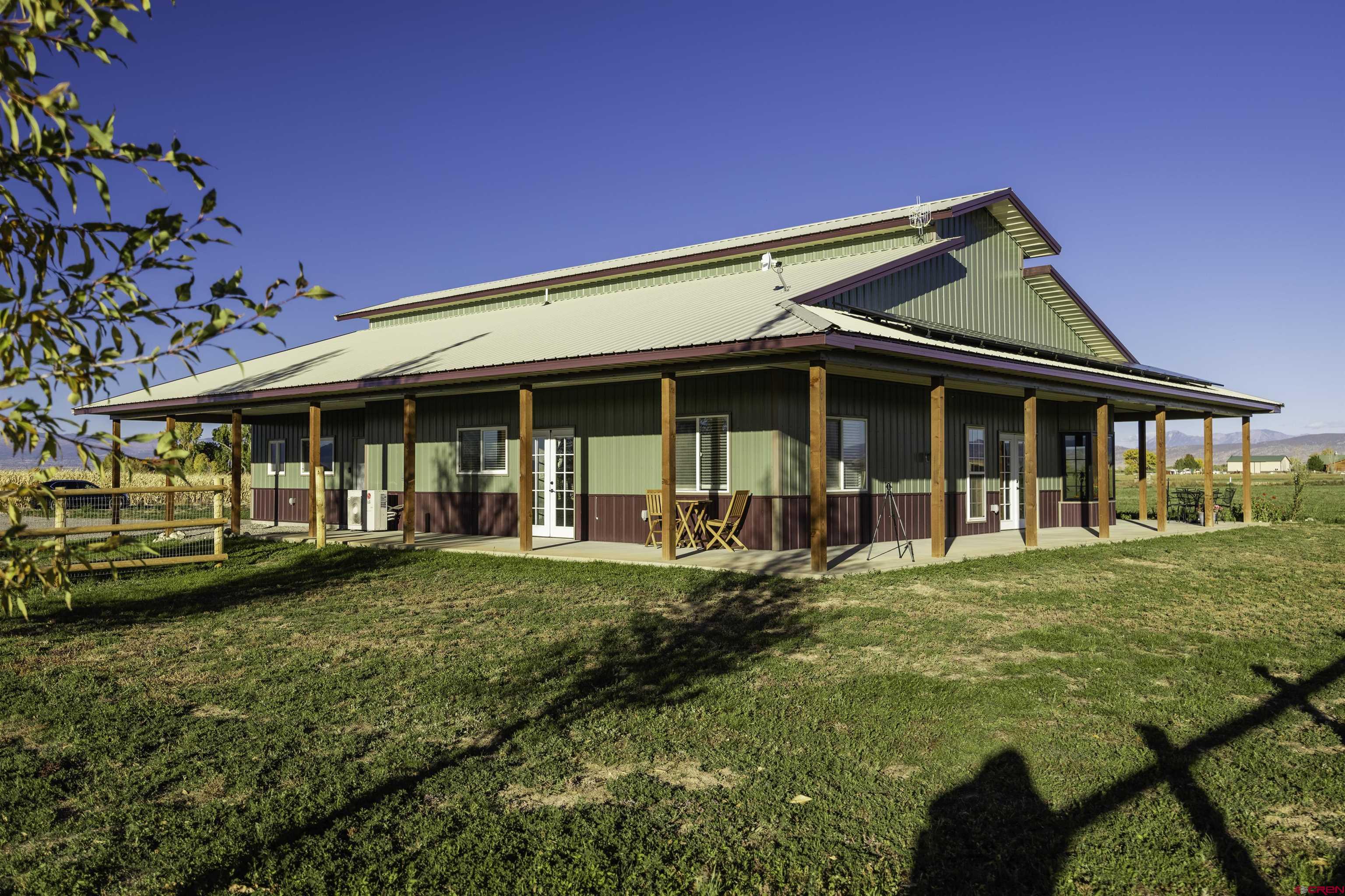 front view of a house with a swimming pool
