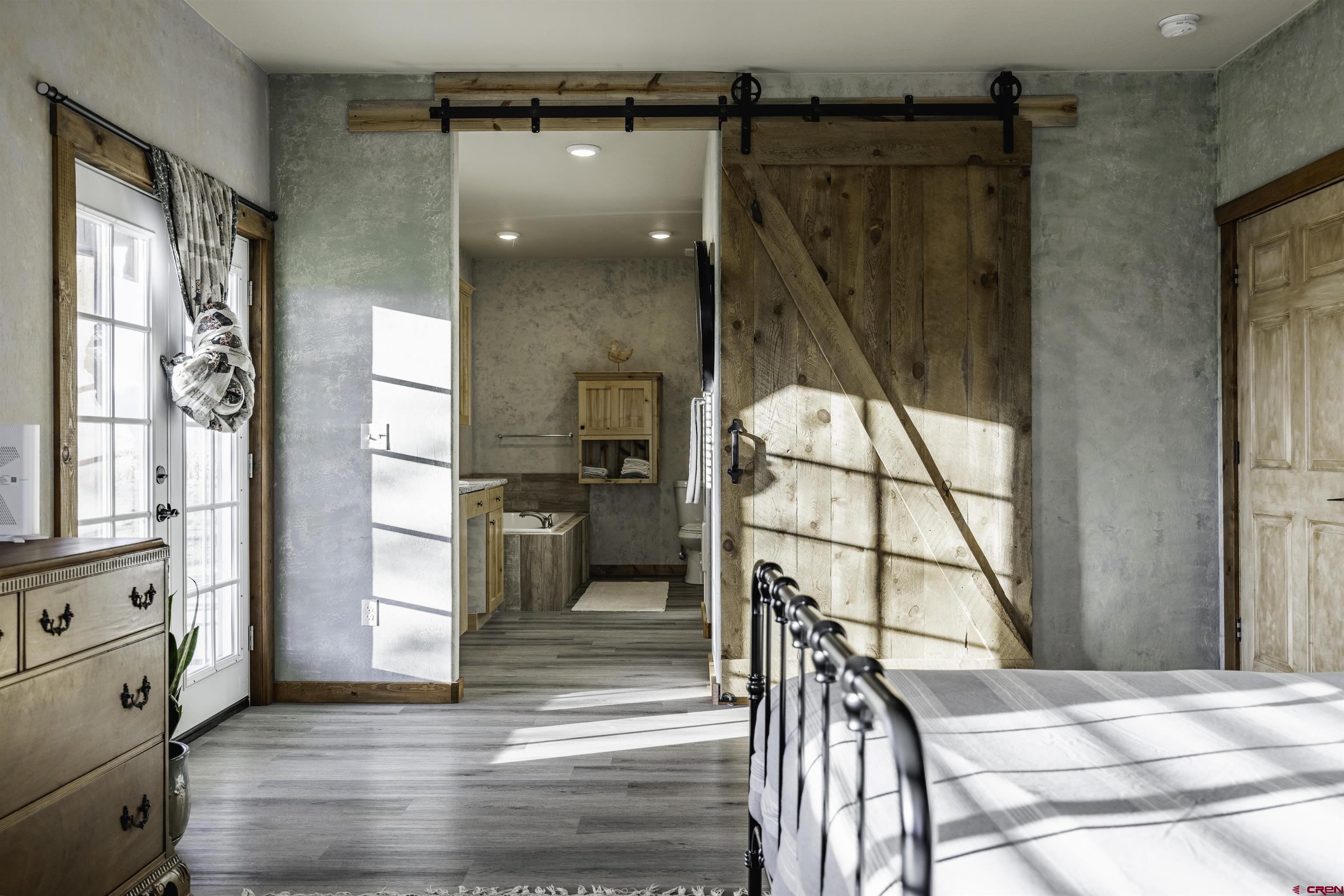 697 Grand Vista Road Delta, CO 81416 - Photo 16 of 44 a view of a kitchen with furniture and windows